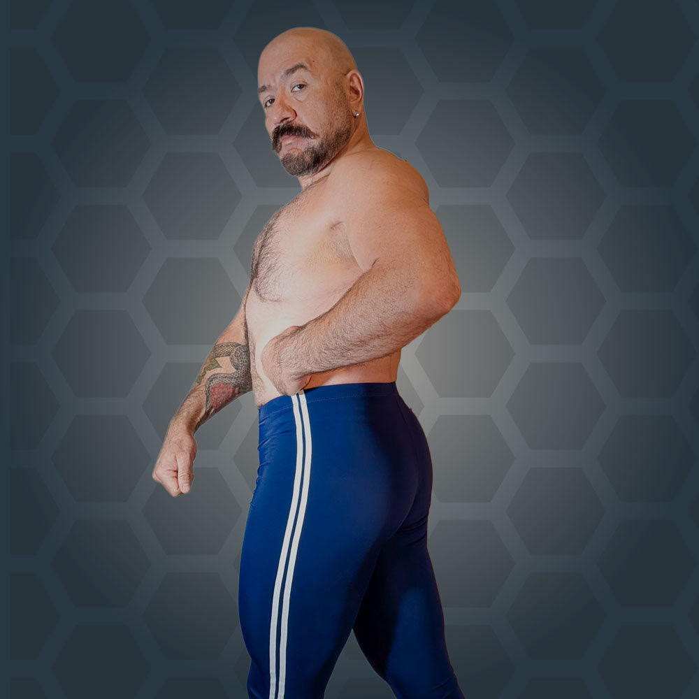 Model in Midnight Cobra tights, three-quarter front view, deep blue with white stripes