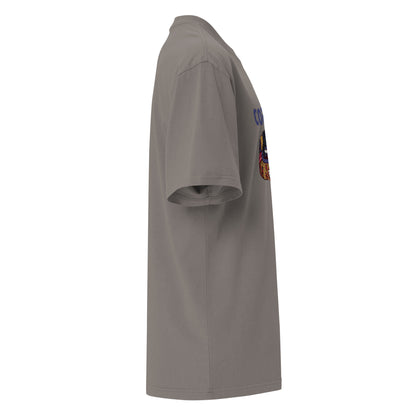 Faded grey Coatlicue oversized distressed tee, right side view, showing the dropped shoulder seam and sleeve.